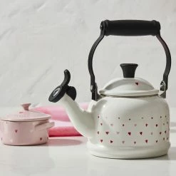 Le Creuset L'Amour Collection 1.25 Qt. Demi Kettle With Heart Applique | White -Le Creuset shop rs18295 221017 lecreuset lamourdemikettle horiz ret